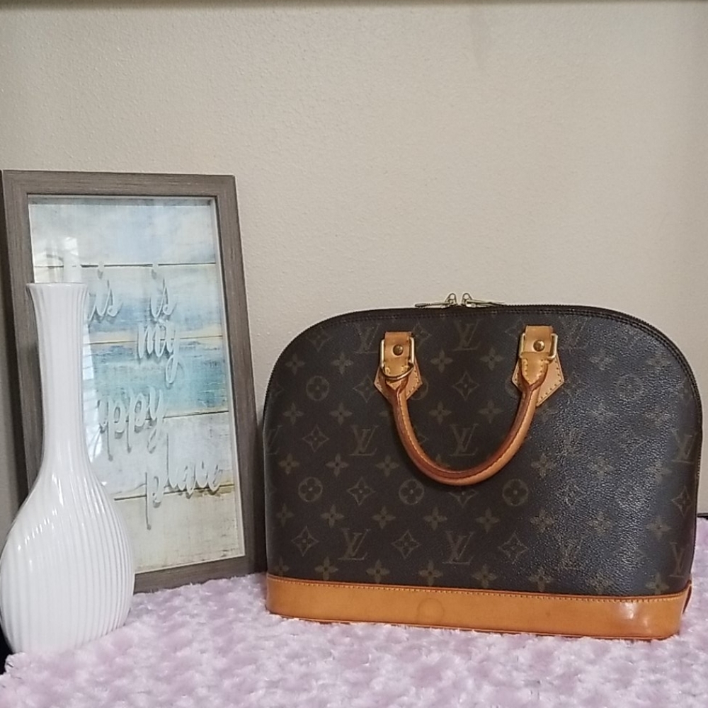 SOLD! LV Alma PM